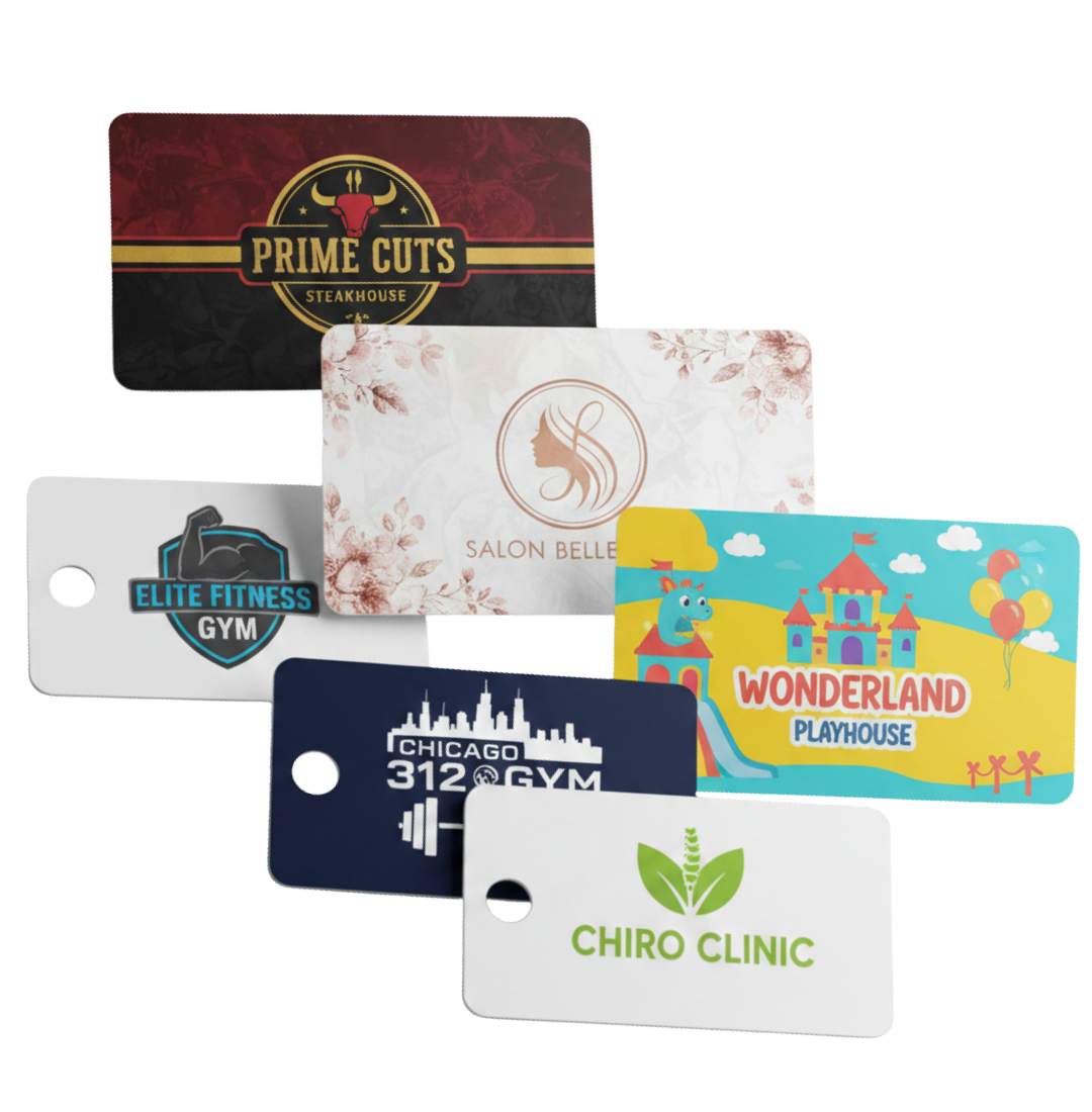 Gift cards and key tags examples including Prime Cuts Steakhouse gift card, Salon Belle gift card, Wonderland Playhouse gift card, Elite Fitness Gym key tag, Chicago 312 Gym key tag, and Chiro Clinic key tag
